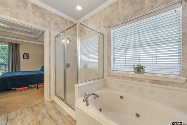 3109 Granbury Ct, Tyler, TX 75707 - bathroom with ornamental molding, connected bathroom, a stall shower, a jetted tub, and wood finished floors