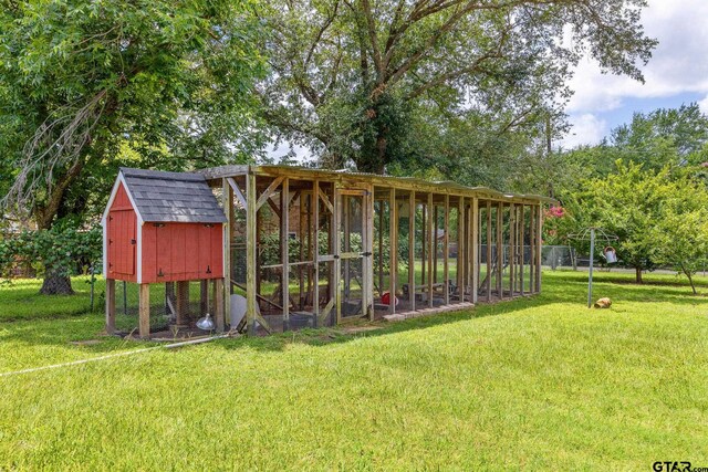 104 W Perry St, Frankston, TX 75763 - view of poultry coop featuring a lawn