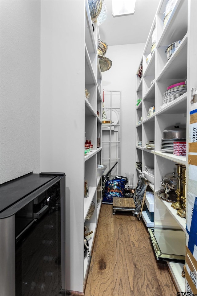 pantry featuring beverage cooler