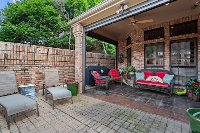 view of patio featuring ceiling fan and an outdoor hangout area