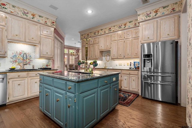 kitchen with crown molding, appliances with stainless steel finishes, dark hardwood / wood-style floors, and a kitchen island