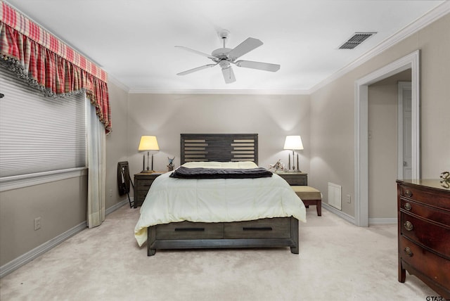 bedroom with light carpet, ceiling fan, and crown molding