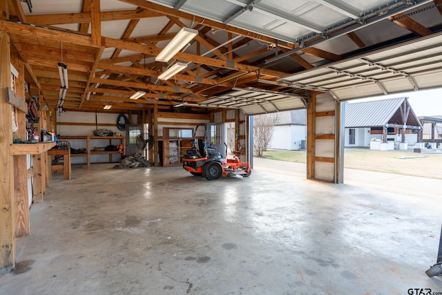 garage with a workshop area