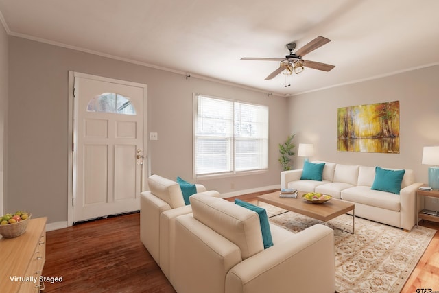 living room with crown molding, a ceiling fan, and wood finished floors