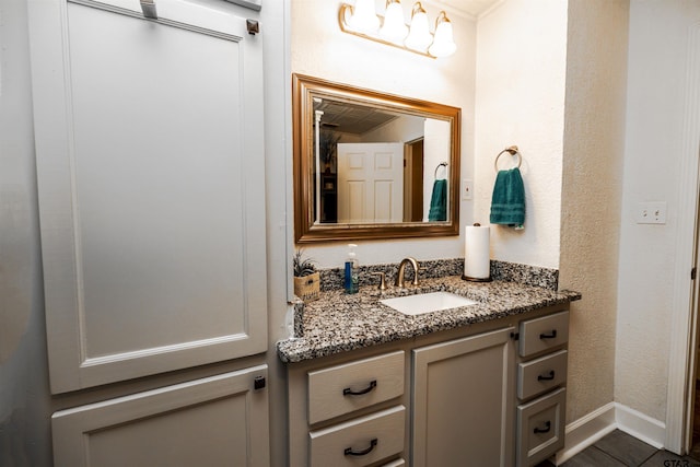 bathroom with tile patterned floors and vanity