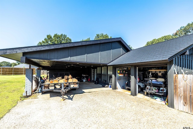 view of front of house featuring an outbuilding