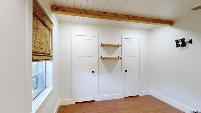 2505 Merry Ln, Tyler, TX 75701 - unfurnished bedroom featuring light wood-style flooring and a wooden ceiling with exposed beams