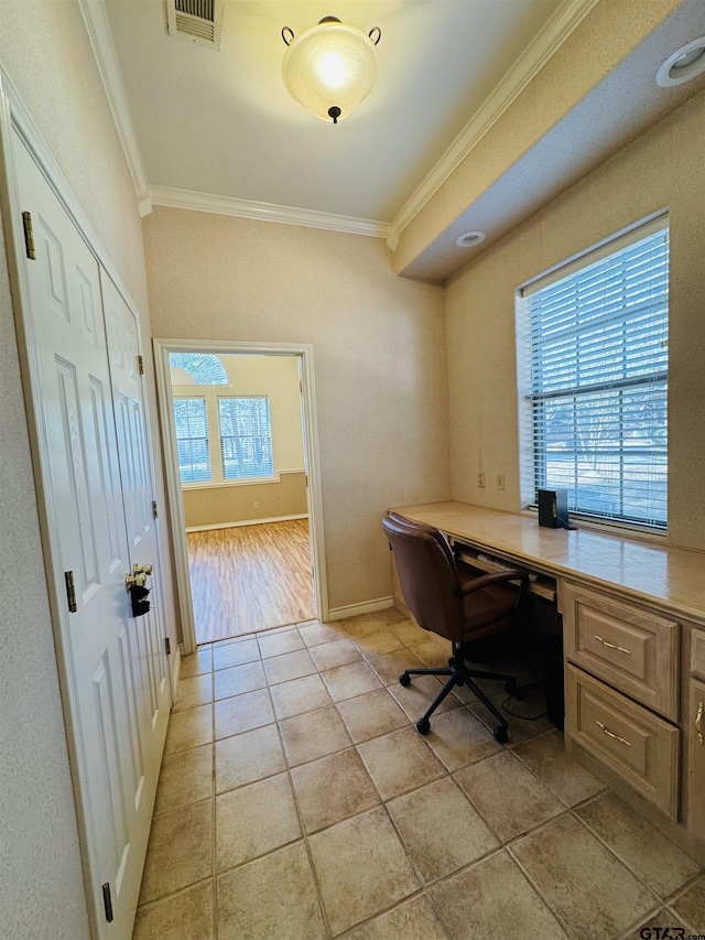 tiled office with crown molding and a wealth of natural light