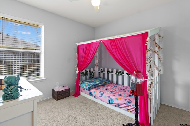 carpeted bedroom with ceiling fan