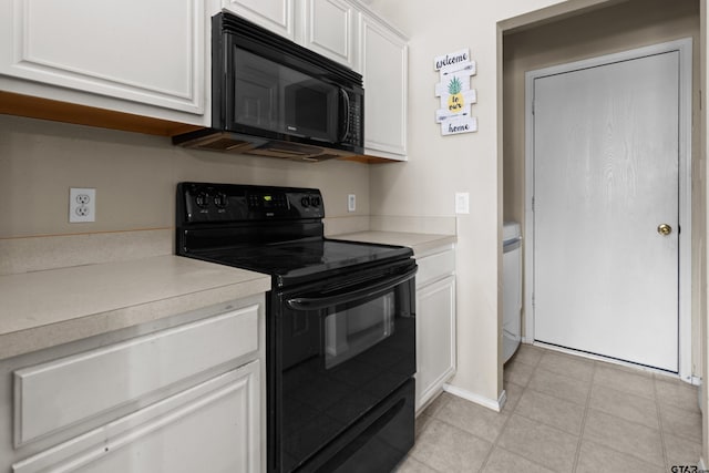 kitchen with white cabinetry and black appliances