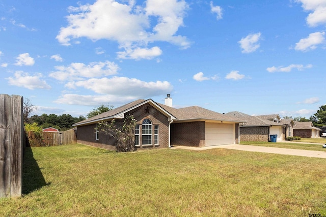 single story home featuring a garage and a front yard