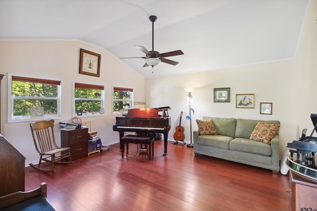 living room with vaulted ceiling, ceiling fan, dark hardwood / wood-style flooring, and ornamental molding