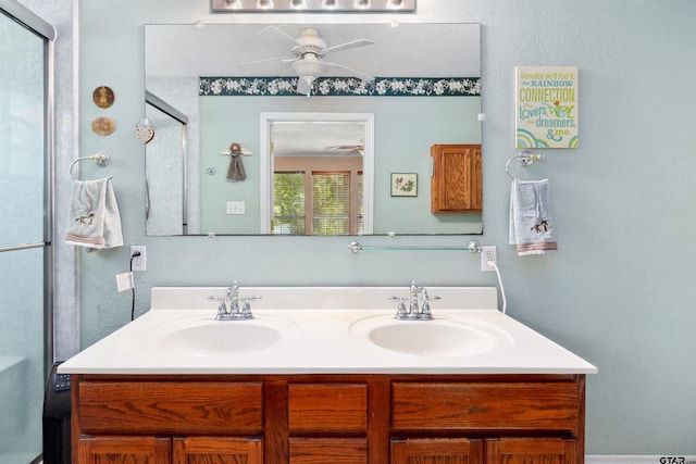 bathroom with ceiling fan and vanity