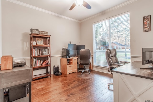 home office with ceiling fan, ornamental molding, and wood-type flooring