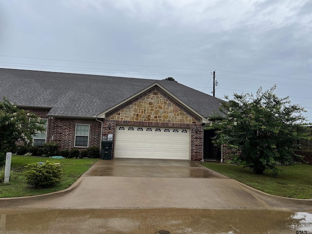 112 Letha Ct, Tyler, TX 75702 - view of front of house featuring a shingled roof, an attached garage, concrete driveway, brick siding, and a front yard