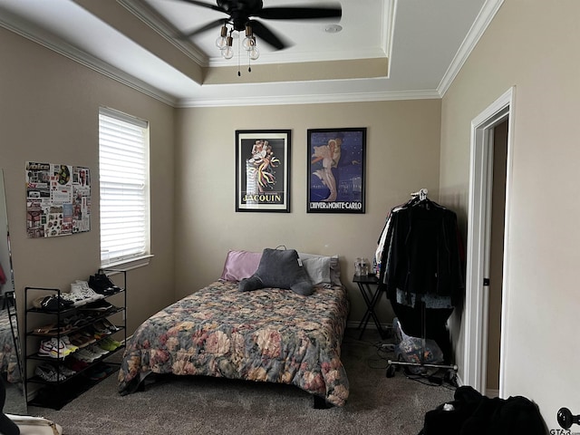 112 Letha Ct, Tyler, TX 75702 - carpeted bedroom featuring a tray ceiling, crown molding, and ceiling fan