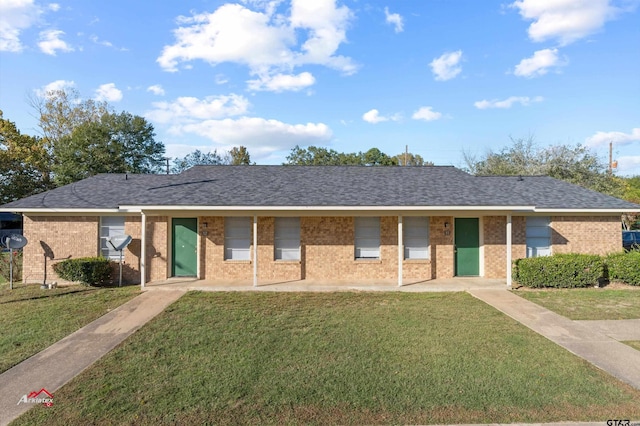 ranch-style house with a front yard