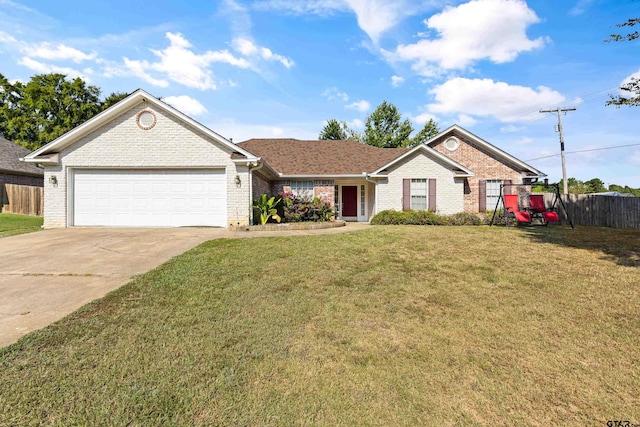 ranch-style home featuring a garage and a front yard