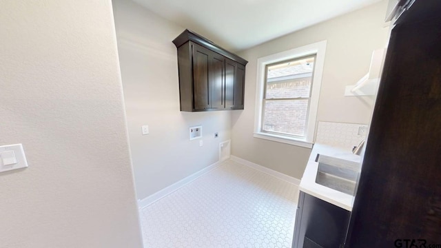 19346 Aida Dr, Flint, TX 75762 - washroom featuring hookup for an electric dryer, hookup for a washing machine, cabinet space, and light flooring