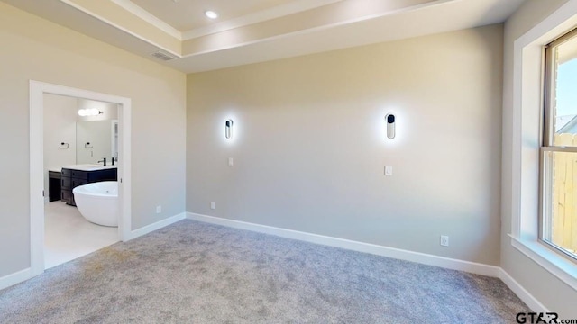 19346 Aida Dr, Flint, TX 75762 - carpeted spare room featuring baseboards and a tray ceiling