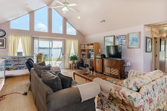 15541 Precidio Cir, Malakoff, TX 75148 - living room with ceiling fan, high vaulted ceiling, and wood finished floors