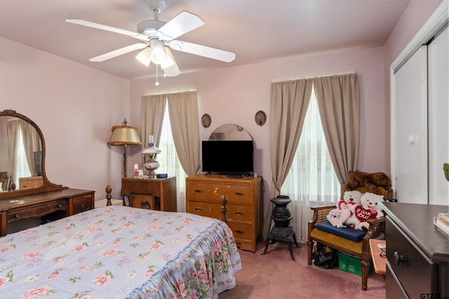 15541 Precidio Cir, Malakoff, TX 75148 - bedroom featuring light carpet, a closet, and a ceiling fan