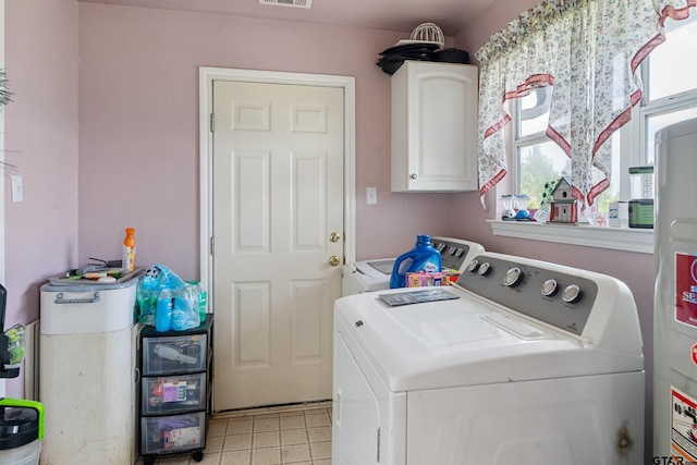 15541 Precidio Cir, Malakoff, TX 75148 - washroom featuring cabinet space, separate washer and dryer, light tile patterned floors, and water heater