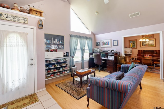 15541 Precidio Cir, Malakoff, TX 75148 - living room with an office area, a chandelier, high vaulted ceiling, and light wood-style flooring
