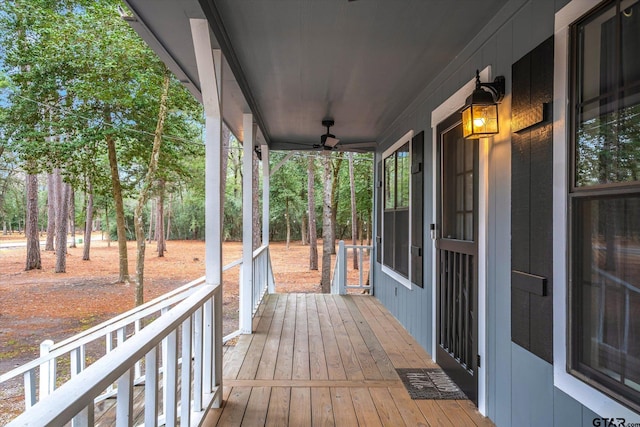 deck featuring ceiling fan and a porch