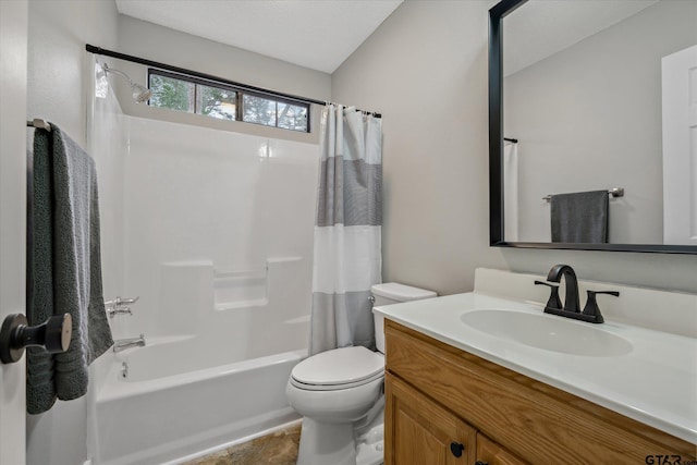 bathroom featuring toilet, shower / bath combo, and vanity