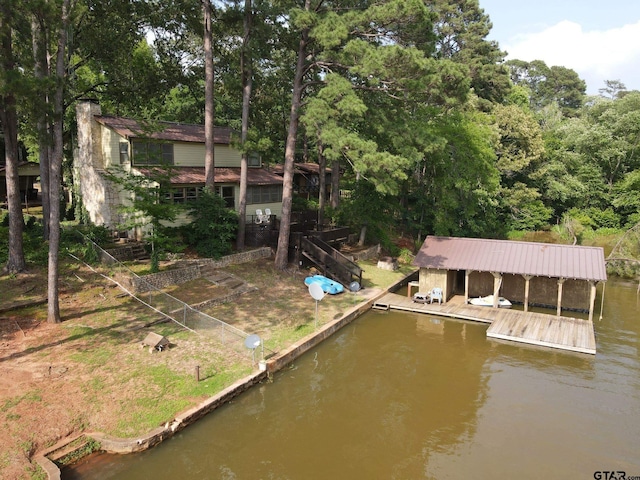 dock area with a water view