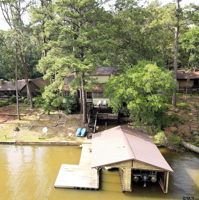 dock area featuring a water view