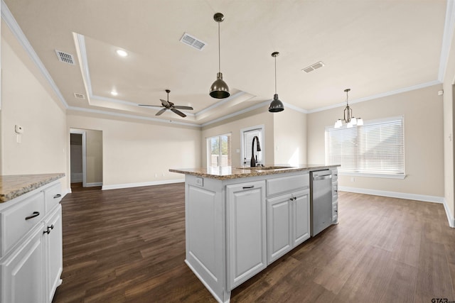 kitchen with pendant lighting, dishwasher, white cabinets, sink, and dark hardwood / wood-style flooring