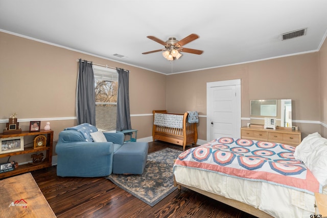 bedroom featuring visible vents, crown molding, ceiling fan, and wood finished floors