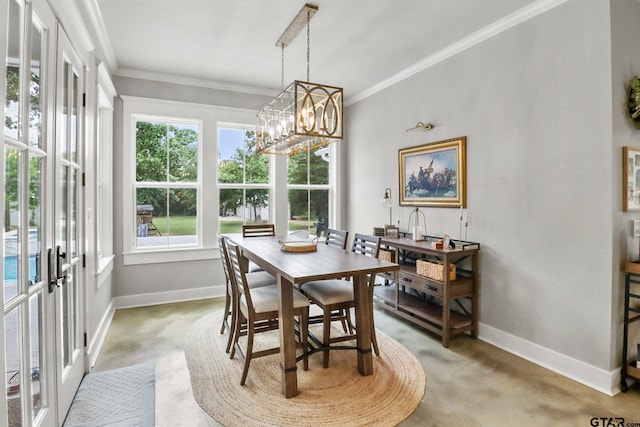 22302 County Road 422, Lindale, TX 75771 - dining area featuring french doors, a chandelier, ornamental molding, and concrete flooring