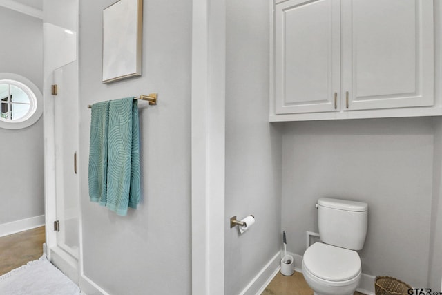 22302 County Road 422, Lindale, TX 75771 - bathroom featuring toilet and baseboards