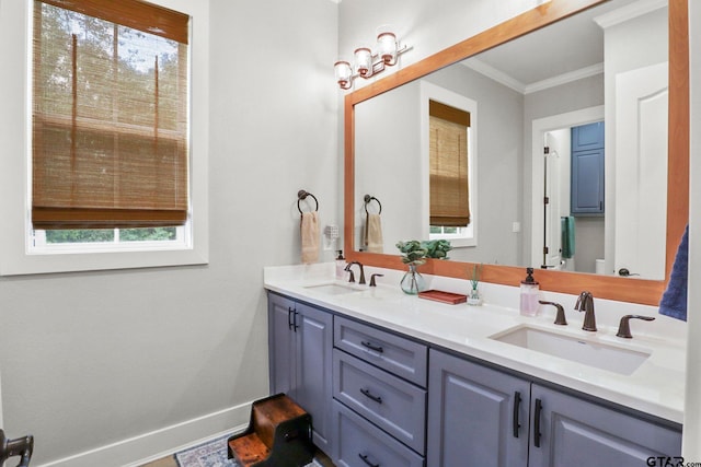 22302 County Road 422, Lindale, TX 75771 - bathroom featuring healthy amount of natural light, double vanity, and crown molding