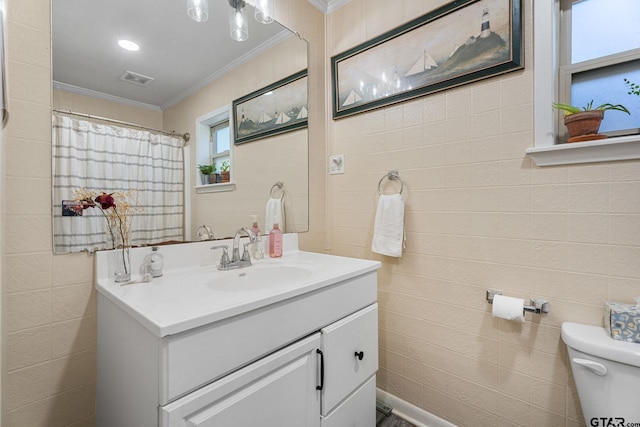 6846 Fm 346, Tyler, TX 75703 - full bathroom with tile walls, ornamental molding, toilet, vanity, and curtained shower
