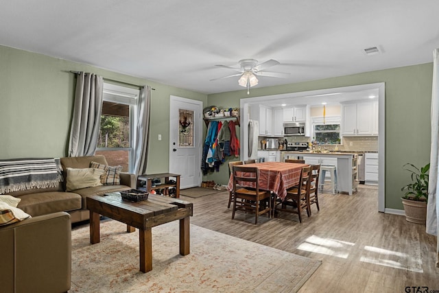 6846 Fm 346, Tyler, TX 75703 - living area with healthy amount of natural light, light wood-style flooring, and ceiling fan