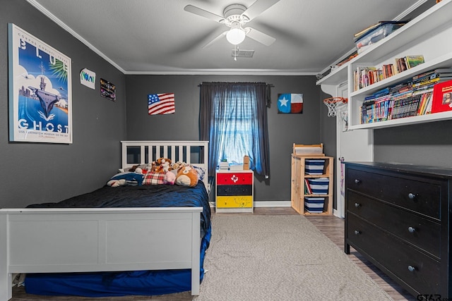 6846 Fm 346, Tyler, TX 75703 - bedroom with crown molding, wood finished floors, ceiling fan, and baseboards