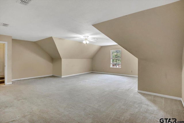 5405 Ashbury Ct, Tyler, TX 75703 - additional living space with carpet, lofted ceiling, and ceiling fan