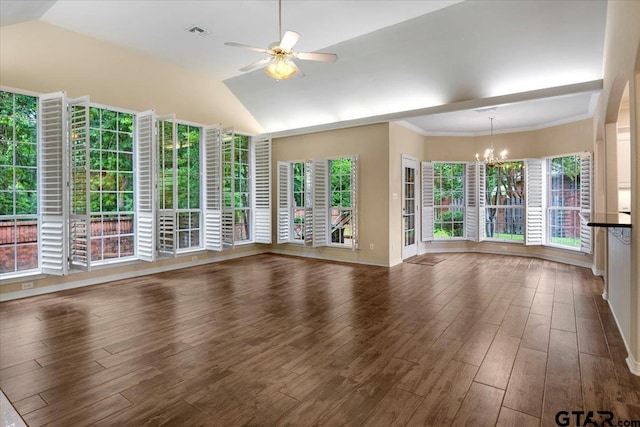 5405 Ashbury Ct, Tyler, TX 75703 - unfurnished living room featuring a chandelier, ceiling fan, vaulted ceiling, wood finished floors, and plenty of natural light