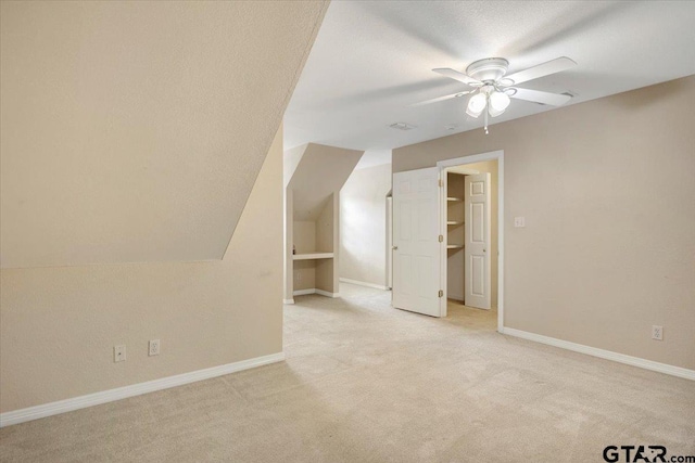 5405 Ashbury Ct, Tyler, TX 75703 - additional living space featuring carpet floors, ceiling fan, and vaulted ceiling