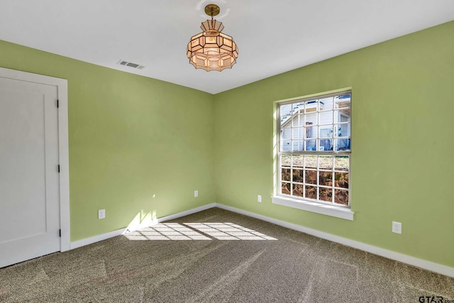 view of carpeted spare room