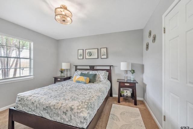 7411 Hollyoak Dr, Tyler, TX 75703 - bedroom featuring carpet and baseboards