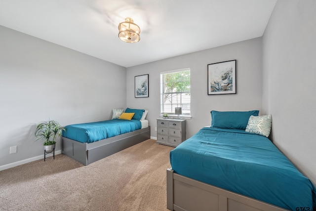 7411 Hollyoak Dr, Tyler, TX 75703 - carpeted bedroom featuring baseboards