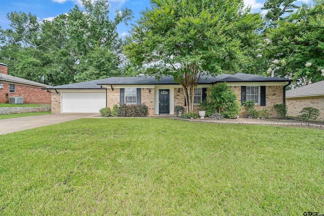 7411 Hollyoak Dr, Tyler, TX 75703 - ranch-style house featuring a garage, driveway, a front yard, and brick siding