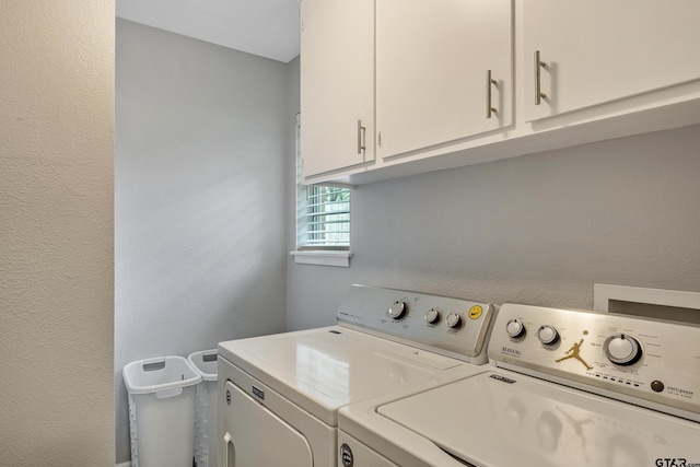 7411 Hollyoak Dr, Tyler, TX 75703 - laundry room with washing machine and clothes dryer and cabinet space