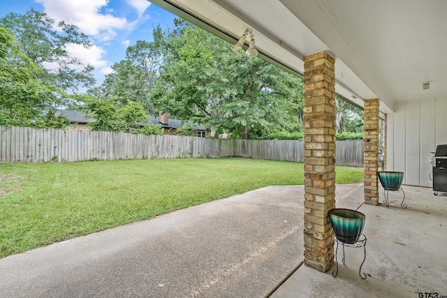 7411 Hollyoak Dr, Tyler, TX 75703 - fenced backyard with a patio