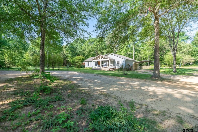 5646 Fm 346, Tyler, TX 75703 - bungalow with a carport, driveway, and a front yard